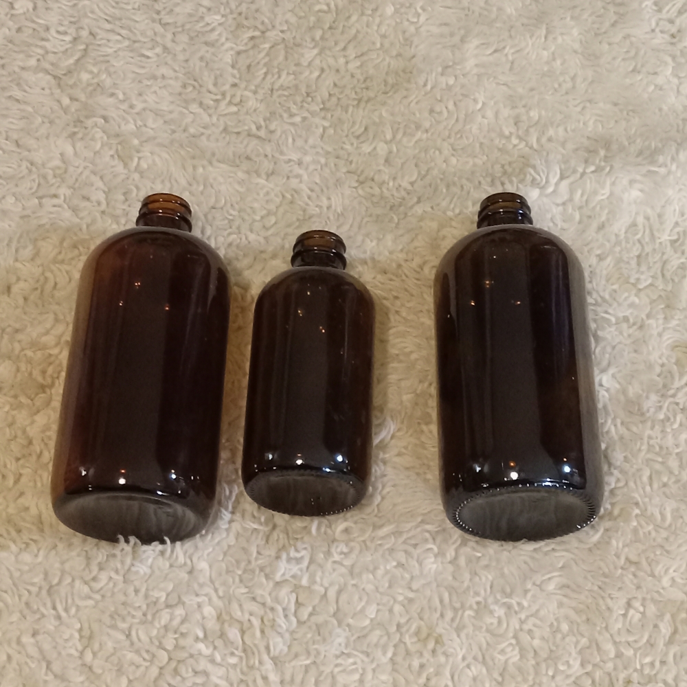 Set of Three Amber Glass Bottles